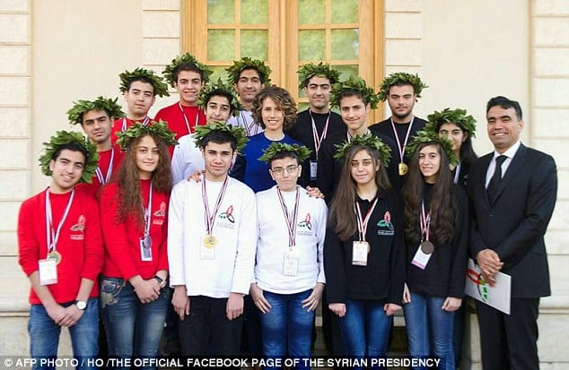 24e2114800000578 2919196 asma al assad c posing for a group picture with the winners of t a 20 1421801434089
