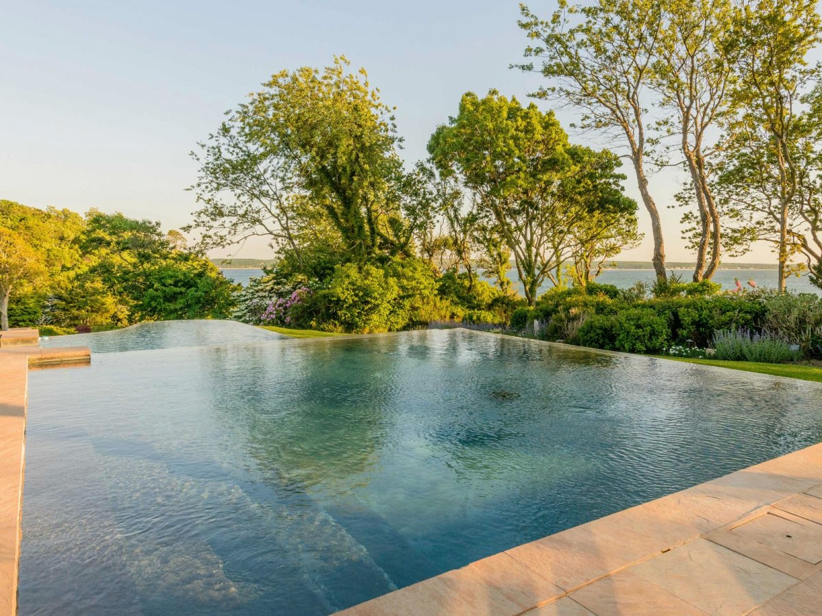 If you want to swim outside, you can take a dip in this two-tiered infinity edge pool.