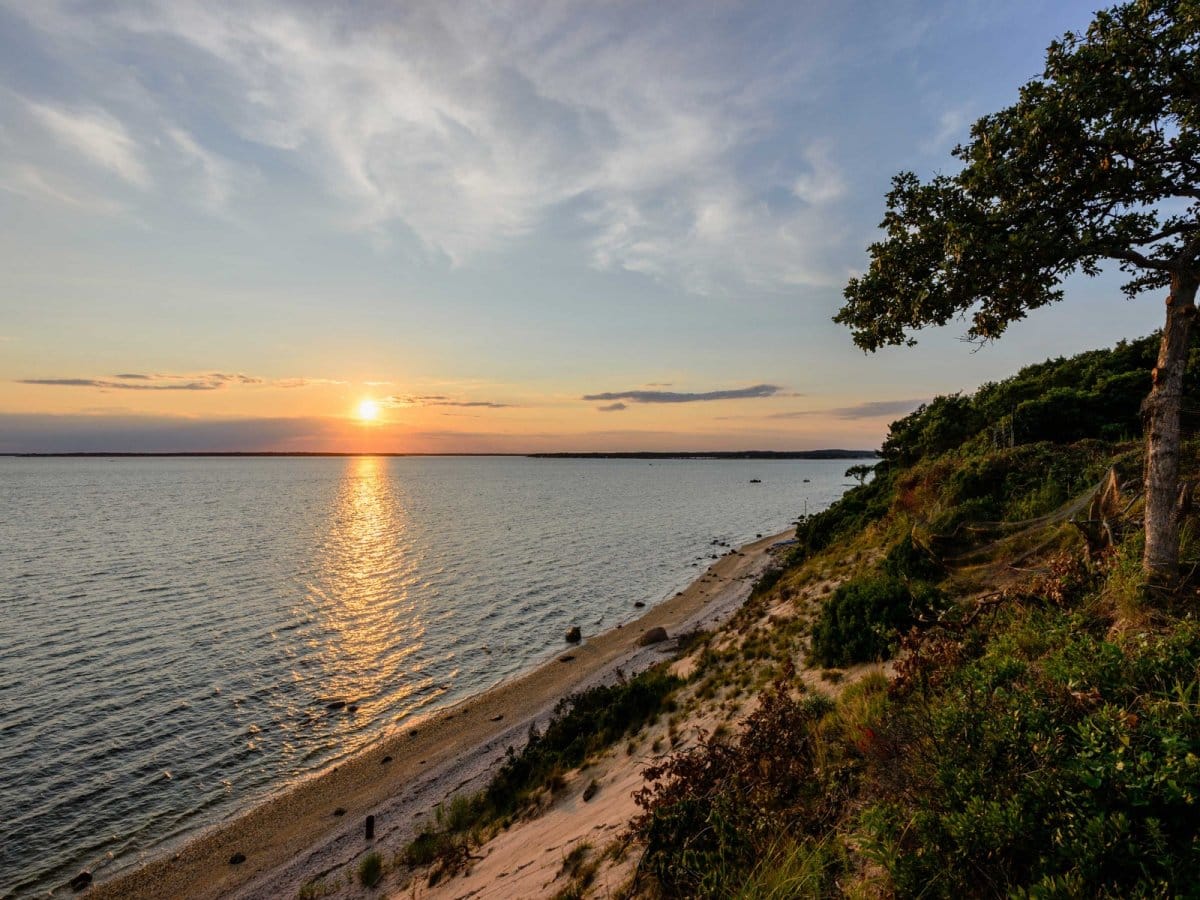 It has access to the water as well as 50-foot bluffs that drop to the beach.