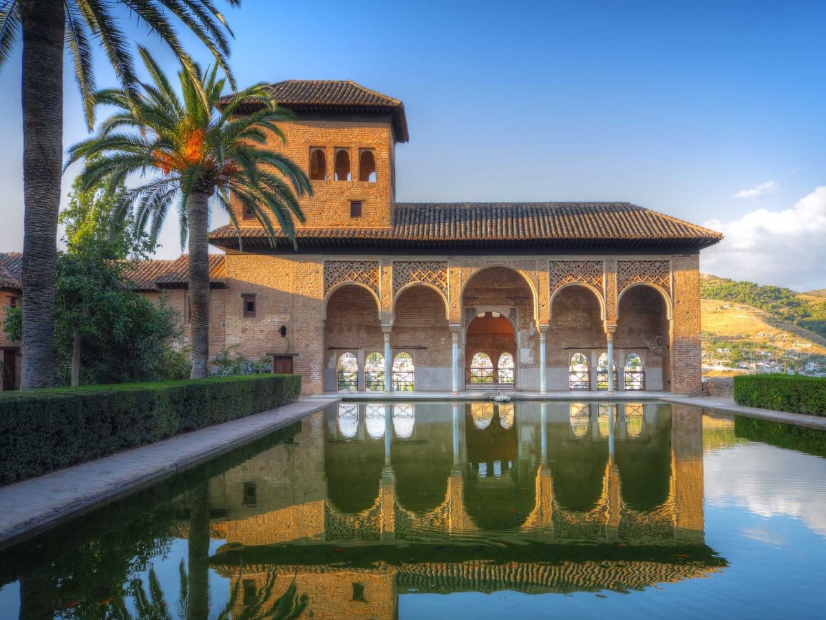 marvel at the moorish architecture and tranquil gardens of the alhambra palace in granada spain