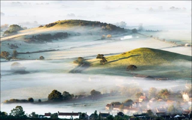 Mist over countryside, England