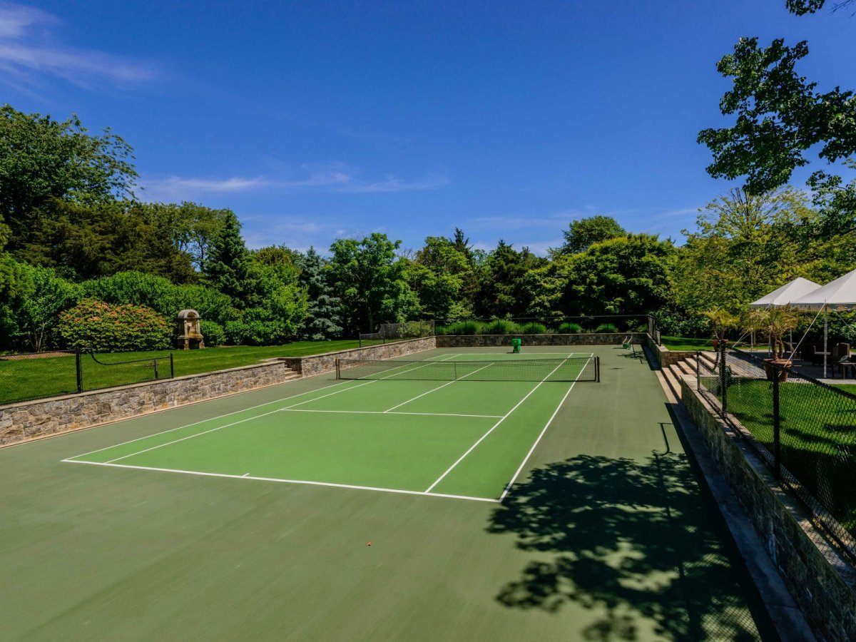 There's a full tennis court on the property as well.