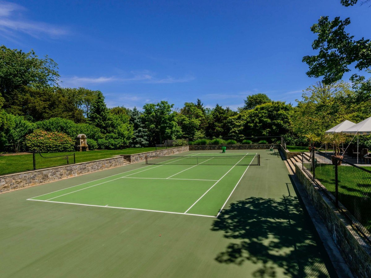 There's a full tennis court on the property as well.