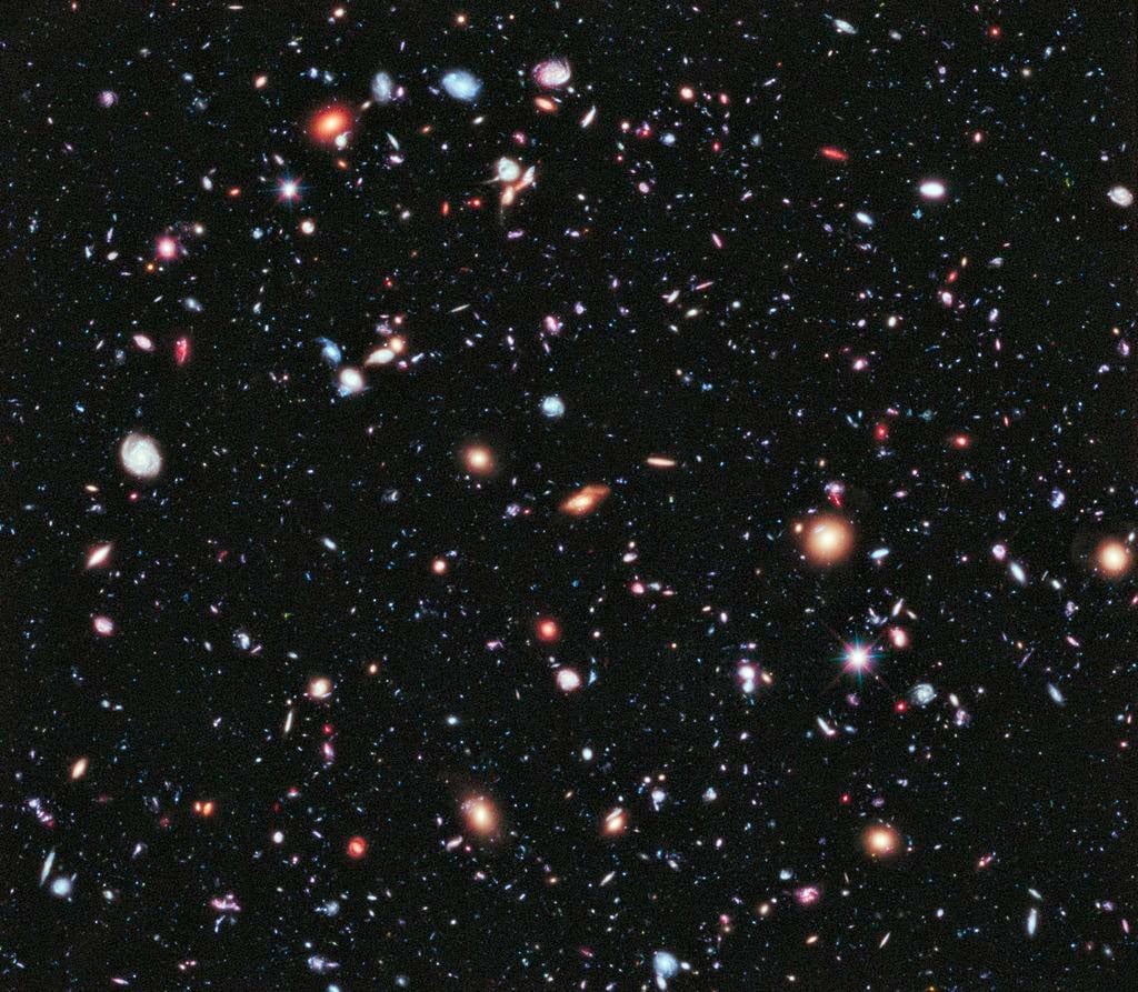100s of galaxies seen through the hubble deep field hdf as they were 10 billion years ago
