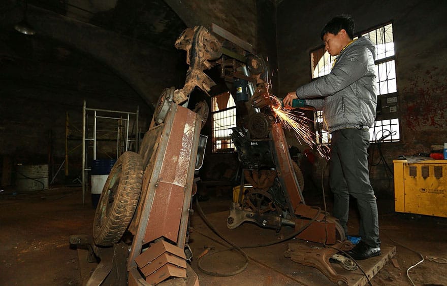 recycled-scrap-metal-sculpture-transformers-father-son-farmer-china-2