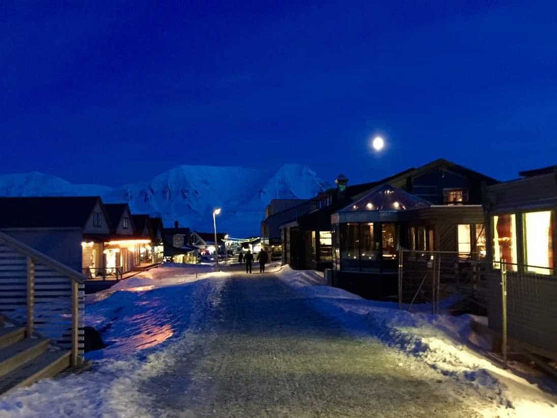 this is the main street of the town of longyearbyen taken at about noon this is the brightest it gets here during the winter months