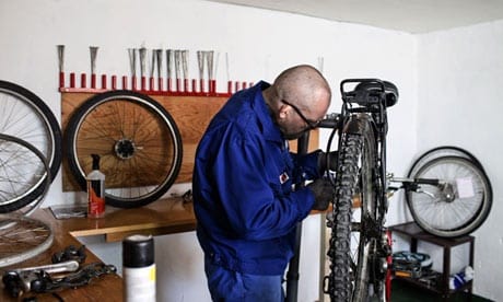 An-inmate-repairs-a-bike.-010
