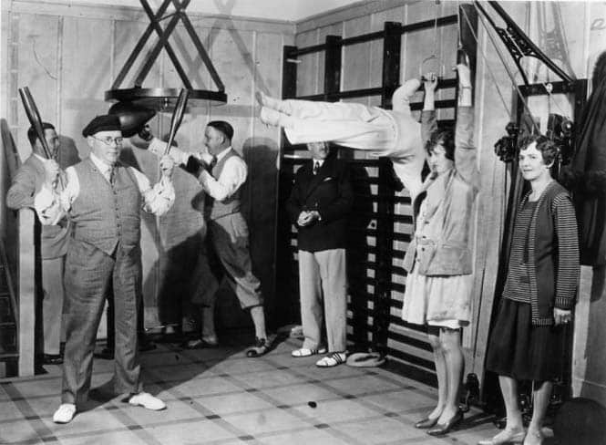 Passengers on the Canadian Pacific liner Duchess of Bedford keep fit in the ship's gymnasium, December 1931.   (Photo by Topical Press Agency/Getty Images)