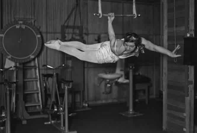 A woman using a piece of apparatus in the gymnasium of the ocean liner S.S Bremen in the 1930's. (Photo by FPG/Getty Images)