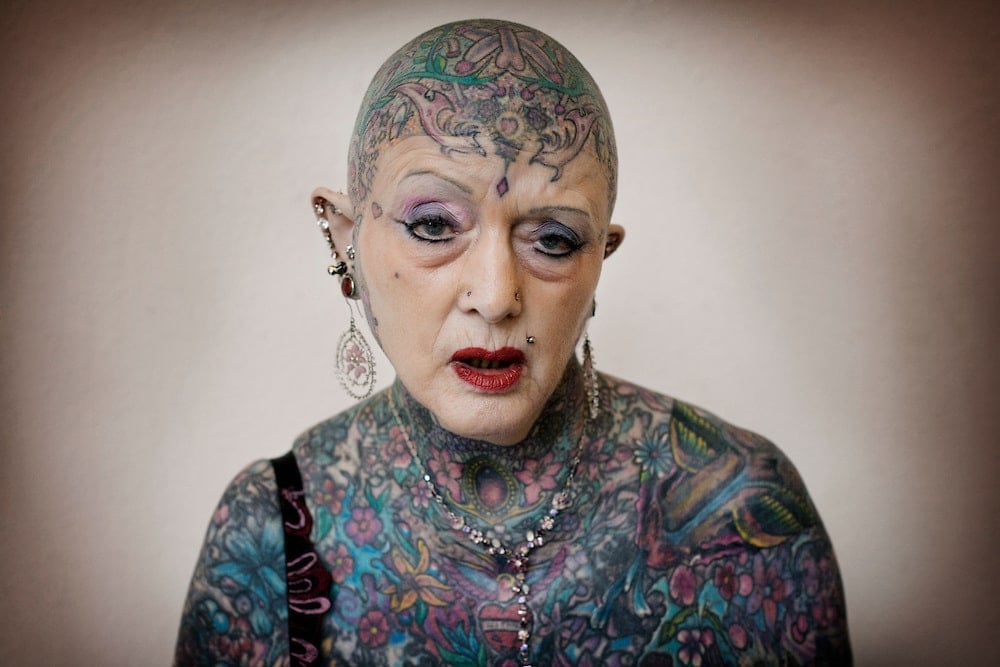 Isobel, Berlin, 2008. PORTFOLIO. Isobel Varley has a full bodysuit of tattoos, and in 2000 she was registered by the Guinness World Records to be The WorldÕs Most Tattooed Senior Woman. She still is today. She regards tattooing as a beautiful art, and is travelling around the world showing her body at different tattoo-venues. Isobel is 73 years old and lives in England. Photo: Andrea Gjestvang/MOMENT