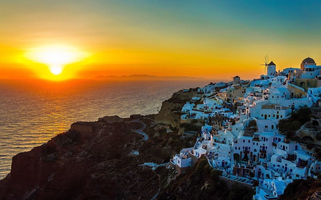 6949070-sunset-oia-santorini-greece