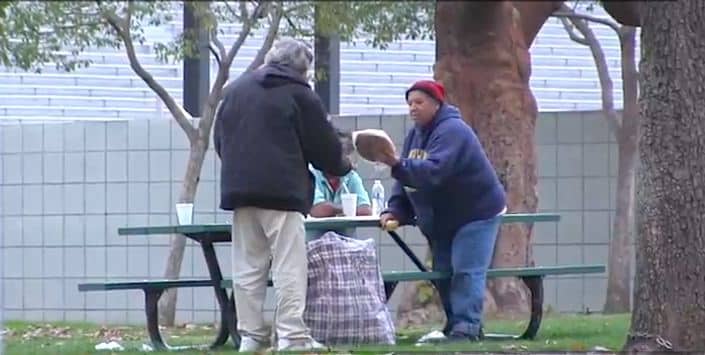 homeless-hands-out-treats-to-strangers-JoshPalerLin