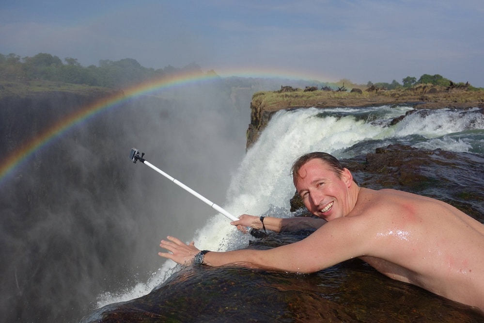 A-year-ago-today,-I-swam-the-Devils-Pool-in-Zambia-with-this-guy-All-of-his-pictures-are-on-my-camera-and-I-have-no-idea-who-he-is-funnyrepost.com-