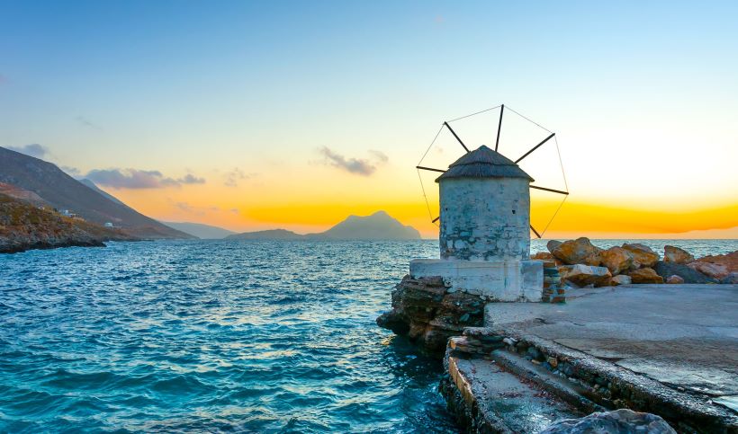 old-windmill-by-the-port-at-the-dawn-of-the-sun