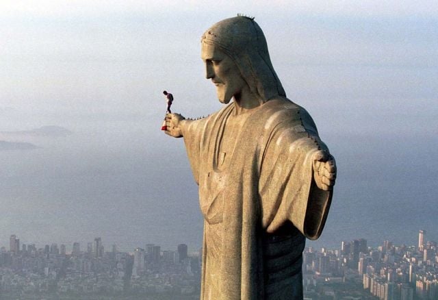 Austrian extreme sportsman Felix Baumgartner prepares to BASE jump from the giant Christ Redentor statue in Rio de Janeiro in this picture taken December 5, 1999. On December 5, 2004, exactly five years after Baumgartner's jump from the Christ statue, he jumped out of a helicopter above Copacabana beach. Baumgartner jumped from the helicopter at an altitude of 1000 metres and opened the parachute 50 metres from the ground. "It was the lowest parachute opening in my career", Baumgartner explained. Picture taken December 5, 1999. NO ARCHIVES NO SALES REUTERS/Wolfgang Luif/Handout