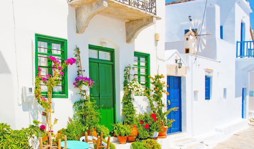 white-greek-island-houses-with-blue-and-green-doors