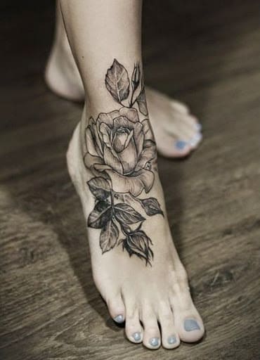 rose tattoo on foot