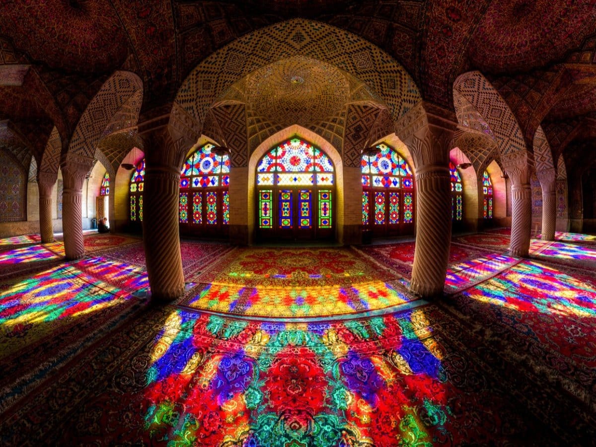 step-inside-the-nasir-al-mulk-mosque-located-in-shiraz-iran-here-an-array-of-stained-glass-windows-transport-visitors-to-a-colorful-paradise