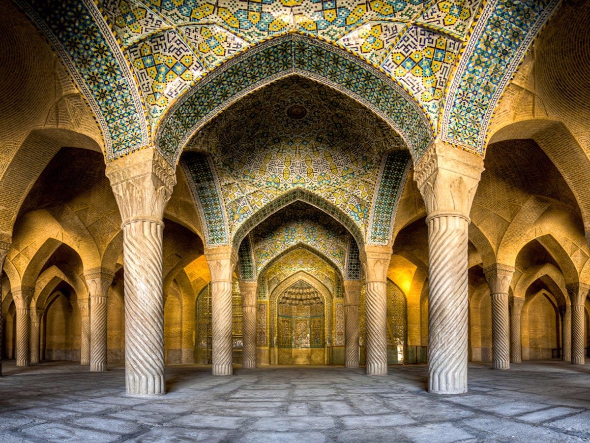 the-nearby-vakil-mosque-was-built-in-the-early-18th-century-and-includes-a-massive-outdoor-prayer-hall-decorated-with-spiraling-columns-arches-and-floral-tiles
