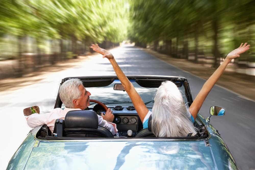 bigstock-Senior-couple-in-sports-car-23188541