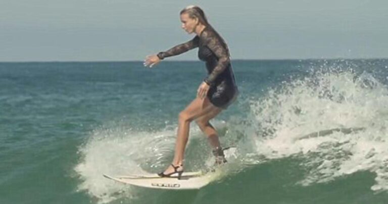Γυναικα σέρφερ δάμασε τα κύματα φορώντας τα τακούνια της!