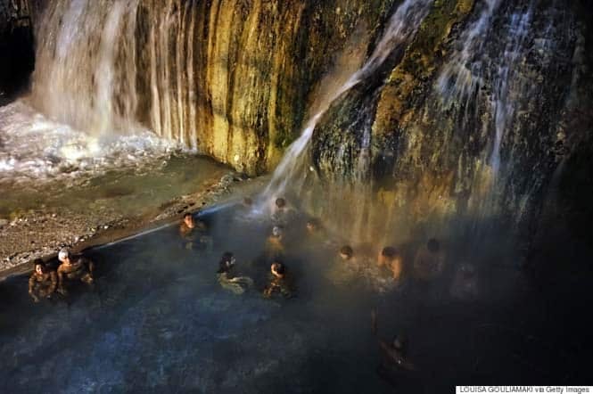 People enjoy open air warm springs next