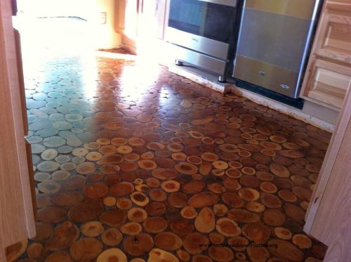 DIY-Old-Surface-Floor-Made-Into-a-Natural-Cordwood-Floor-6