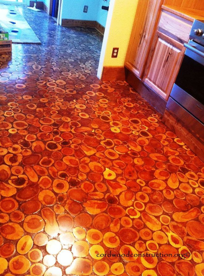 DIY-Old-Surface-Floor-Made-Into-a-Natural-Cordwood-Floor-7