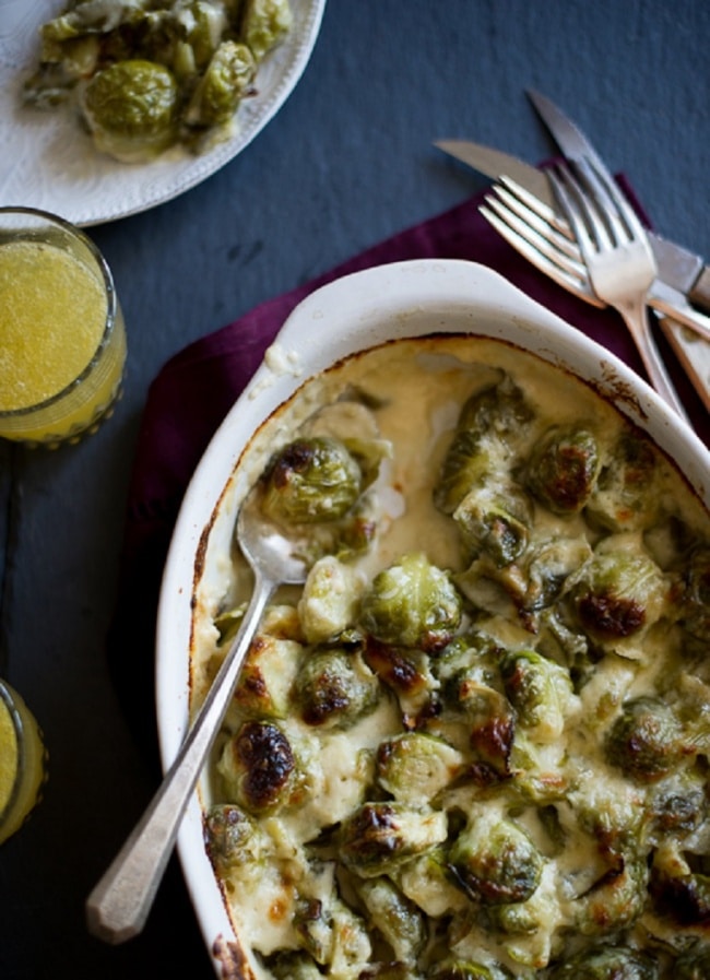 15303310-R3L8T8D-650-Cheesy-Brussels-Sprouts-Gratin
