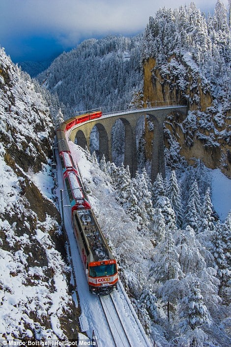 31F2FEDD00000578-0-The_red_train_also_travelled_across_the_Landwasser_Viaduct_in_Fi-a-42_1457355327776-1