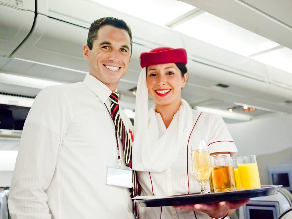 I love the Emirates female flight attendants' hats! So I asked this female flight attendant if I could take her picture. She blushed and then asked her male coworker to come over and be in the picture with her. I wondered if it was because she didn't want to be in the picture alone?