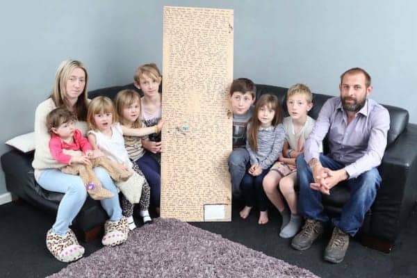 PIC FROM CATERS NEWS - (PICTURED: Mum Caroline, Naysa 1, Letissia-Dior 2, Indika-Mayah 4, Porscha, Ethan 11, Tiana 5,Harley 8 and dad Dean with the message on the back of the mirror) -A 12-year-old girl who died following a battle with cancer left a heart-wrenching secret message hidden on the back of her mirror. Athena Orchard, died last Wednesday (May 28) after losing her fight with the terminal disease. Just days after her death, Athenas dad Dean was stunned to discover a giant heartfelt note written in marker pen on the back of his daughters mirror. The message was written after Athena was diagnosed with cancer - which she discovered after finding a tiny lump on her head in December last year. Before she died, she penned the lengthy message which remained undiscovered until days after her death. SEE CATERS COPY.