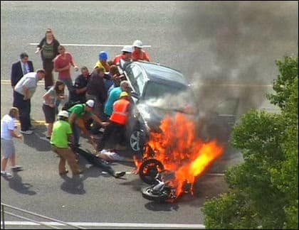 When-these-bystanders-joined-forces-to-literally-lift-a-car-off-of-a-trapped-motorcyclist