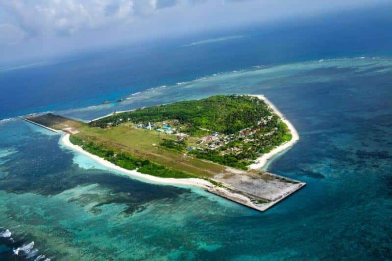 The island of Pag-Asa, seen from a naval Islander plane en route between Pag-asa, known internationally as Thitu, and Puerto Princesa, Palawan, over the South China Sea on August 15, 2013. (Photo by Ashley Gilbertson / VII Photo)