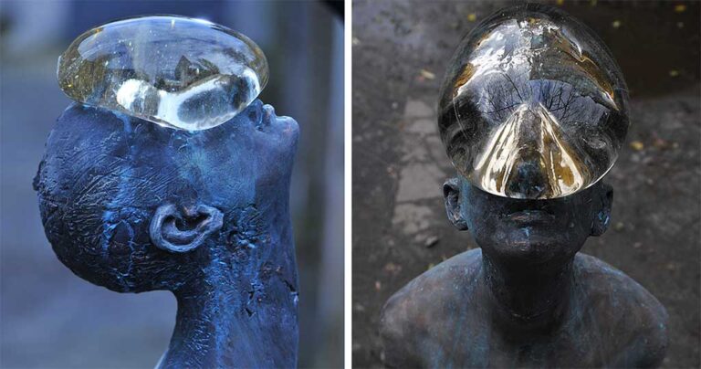 Μια τεράστια σταγόνα βροχής ξεκουράζεται στο πρόσωπο αυτού του αγάλματος.