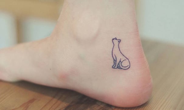 tiny-foot-tattoo-ideas-11-575015851a32e__605