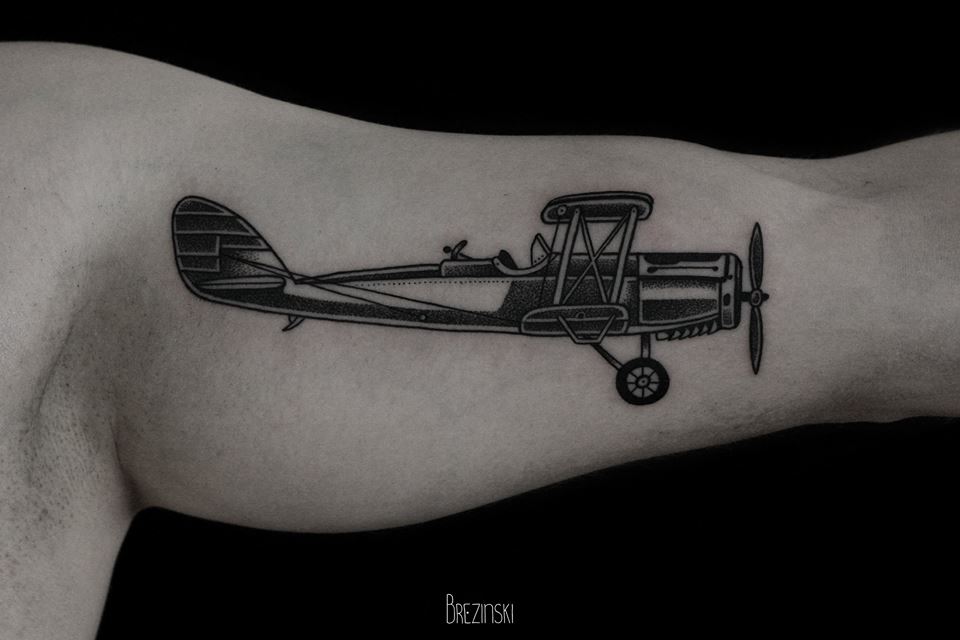 plane-tattoo-by-Ilya-Brezinski