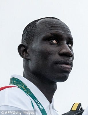 36BAFF6600000578-3726543-James_Nyang_Chiengjiek_left_South_Sudan_athletics_400m-a-1_1470464076557