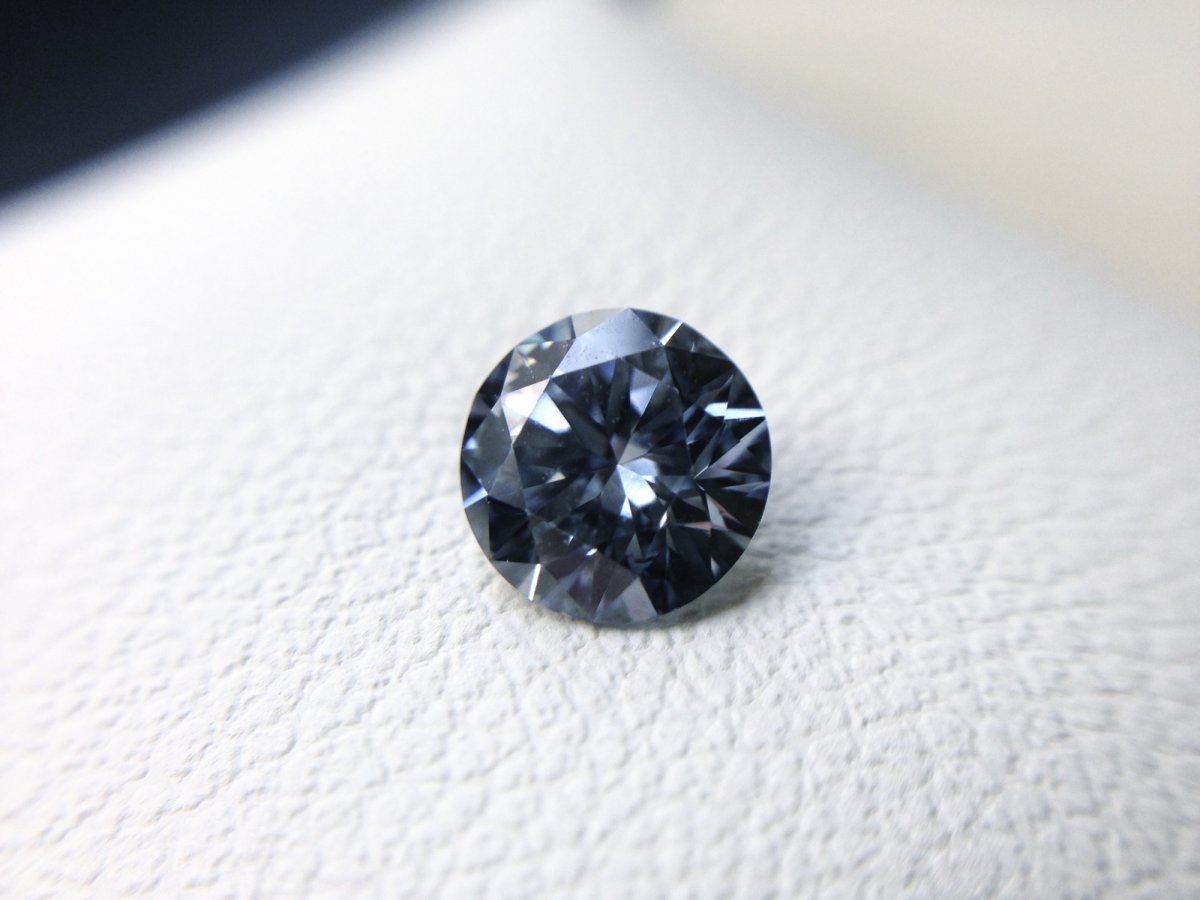 Boron is the impurity that colors the rare blue diamonds found in nature — and is why many "memorial diamonds" come out blue, too.