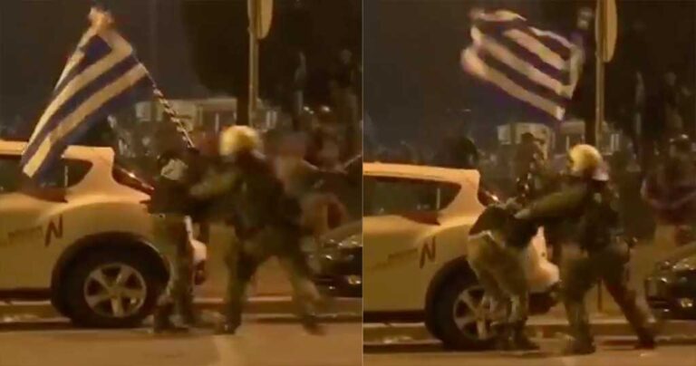 Θεσσαλονική: Άντρας των ΜΑΤ χτυπάει πολίτη που κρατάει την ελληνική σημαία