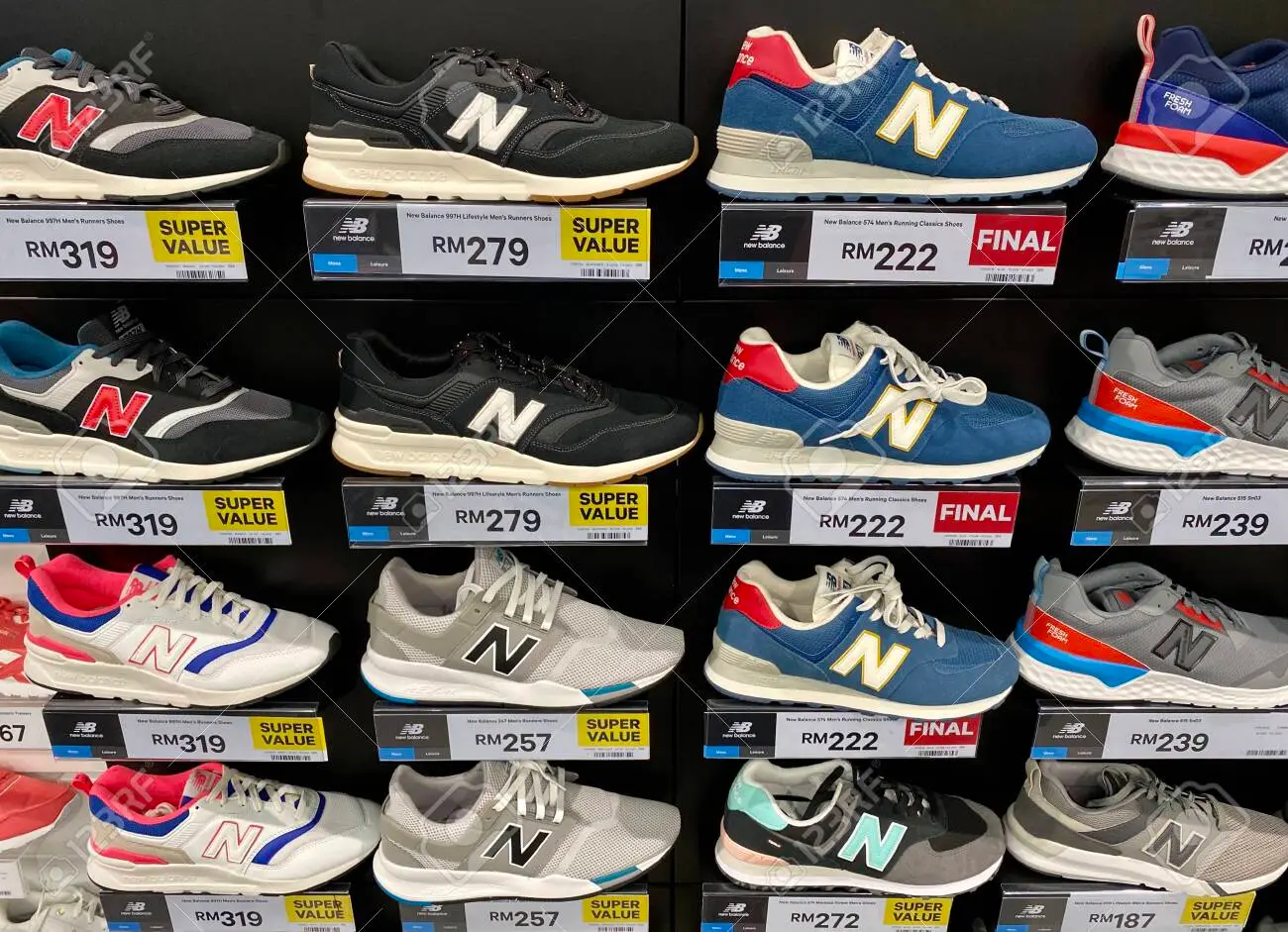 147835650 kuala lumpur malaysia may 18 2020 row of new balance sport shoes on display in local sports outlet