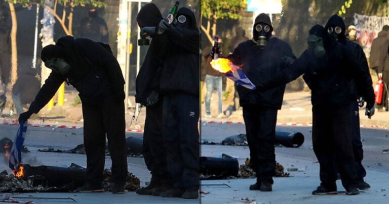 Θεσσαλονίκη: Κουκουλοφόροι έκαψαν την ελληνική σημαία στη πορεία για τον Γρηγορόπουλο