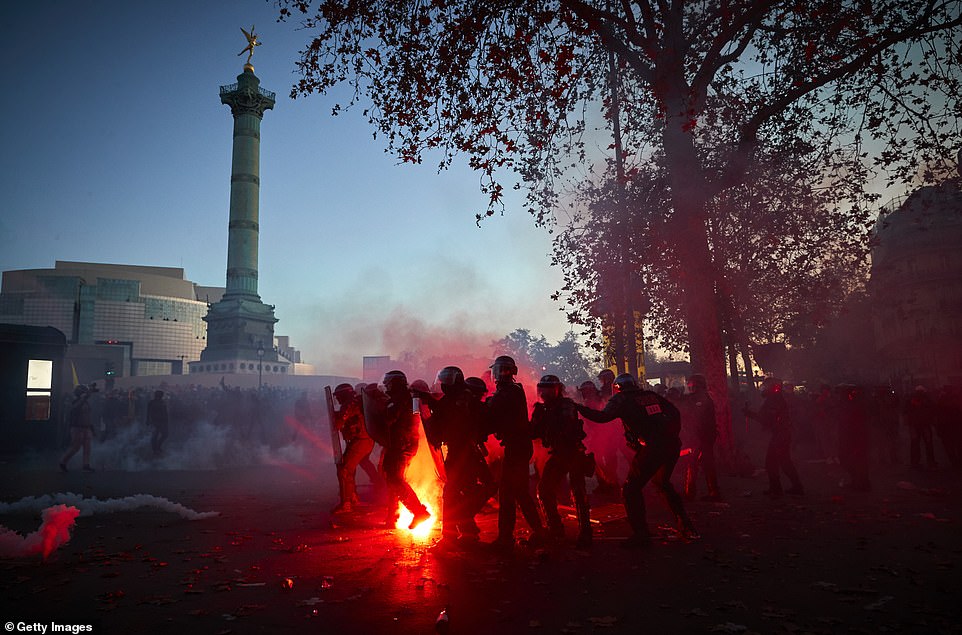 36208322 8996437 pictured french riot police clash with protestors as demonstrati a 56 1606598228443