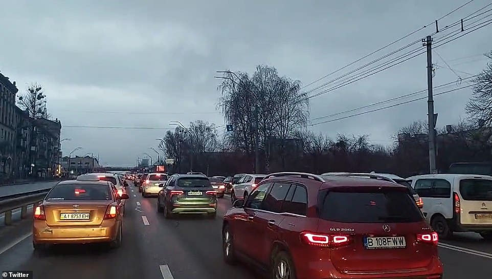 54586749 10545977 residents were seen traveling to work even as air raid sirens we a 10 1645692072606