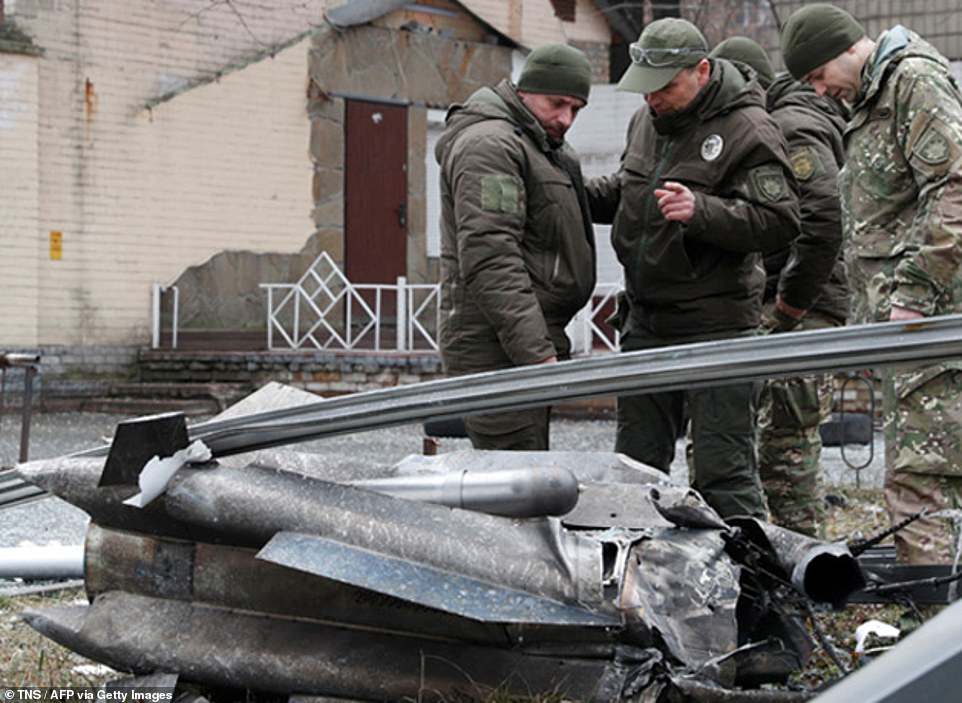 54591319 10545977 soldiers in ukraine stand by debris on thursday morning after ru a 7 1645692072601