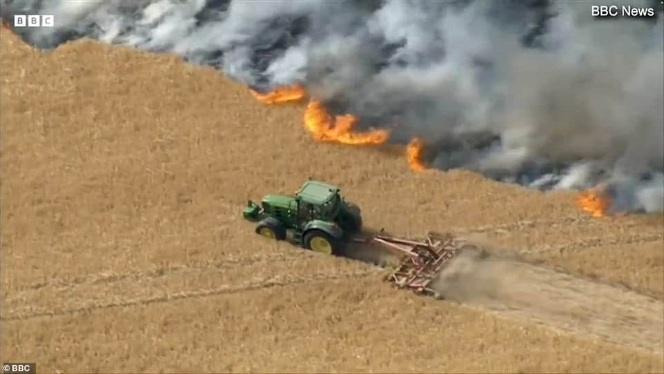 60627141 11043315 farmer bill alexander rapidly stepped in and used his tractor to a 13 1658652039971