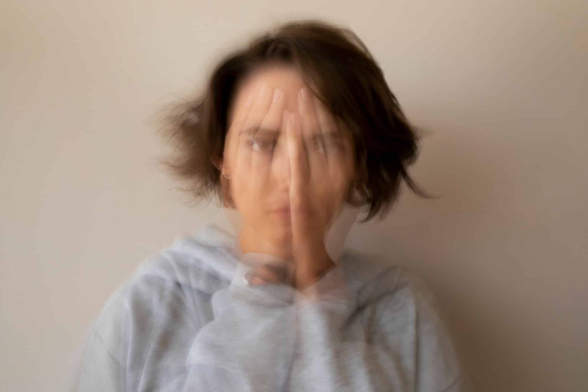 blurry woman dealing with anxiety front view 23 2149485864