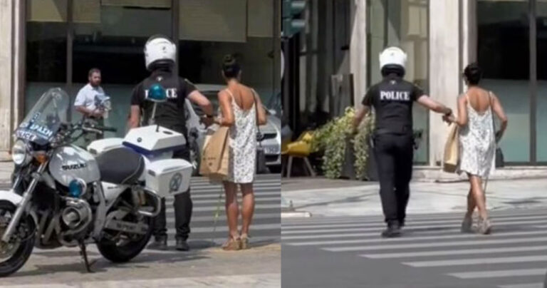 Αστυνομικός-πρότυπο παίρνει από το χέρι τυφλή γυναίκα και την περνάει από τον δρόμο