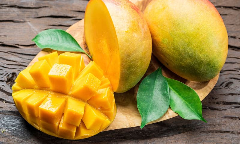 gfqyqwnazmb5 bigstock mango fruits and mango slices 233735233