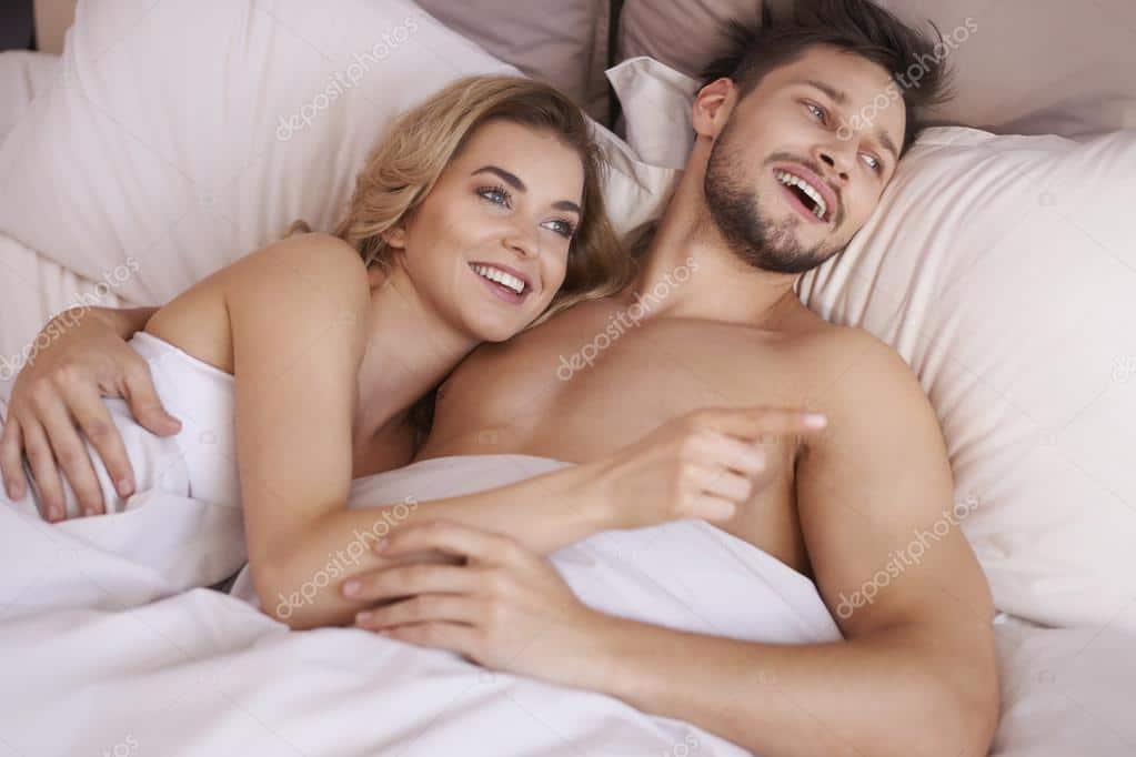 depositphotos 83665938 stock photo happy couple in bed